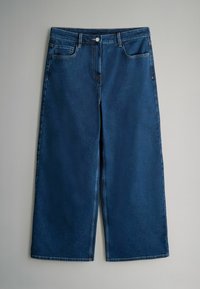 Tmavomodré široké džínsy s gombíkovým zapínaním, prednými vreckami a prešitím. Hladká textúra s jemným leskom.