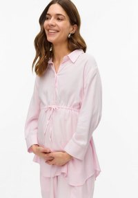 Maglietta premaman a righe rosa chiaro con maniche lunghe e vita regolabile con coulisse. Tessuto morbido con vestibilità comoda, dotata di colletto e bottoni.