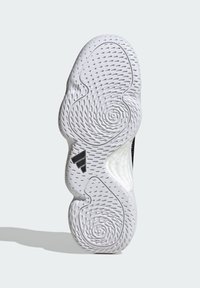 Sneaker sole featuring a textured white rubber with spiral patterns and perforations, highlighted by a black accent near the heel.