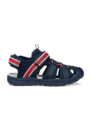 Sandalo da bambino blu navy con cinturini regolabili a righe rosse e bianche, tessuto in mesh, punta chiusa e suola in gomma.