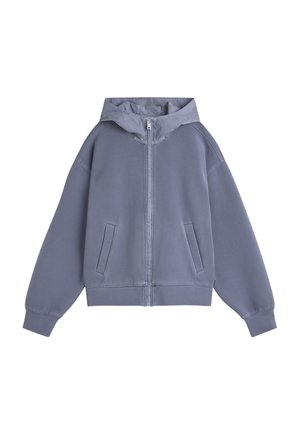 Sweat à capuche gris clair à fermeture éclair avec poches avant et poignets côtelés, présenté à plat sur un fond blanc.