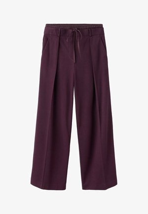 Szerokie spodnie z ciemnopurpurowej tkaniny, z elastycznym pasem i sznurkiem do wiązania. Posiadają dwie boczne kieszenie oraz delikatne zakładki z przodu.