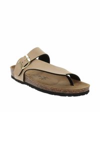 Sandal beige con una fascia ampia e una fibbia dorata, soletta in sughero e suola nera texturizzata; presenta un design a infradito per il supporto delle dita dei piedi.
