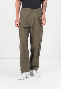 Oakley NEW RETRO PANTS - Oldalzsebes nadrágok - raven