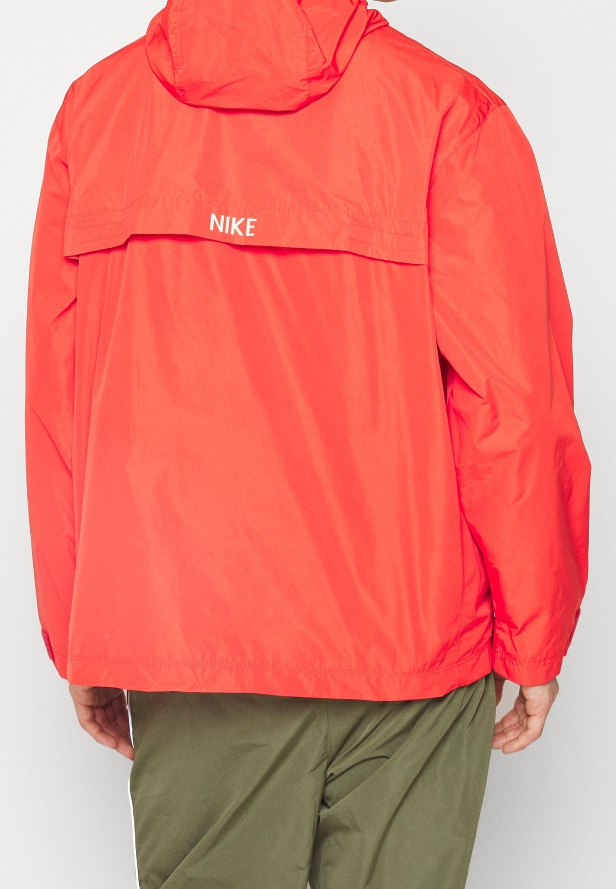 red nike pullover windbreaker