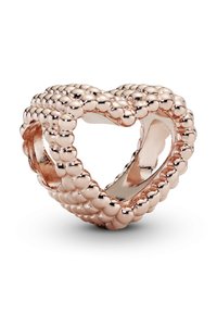 Perla a forma di cuore in metallo tono oro rosa. Presenta una texture a perline e un centro cavo. Finitura liscia con bordi arrotondati.