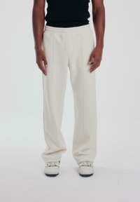 PROHIBITED LOOSE  - Tracksuit bottoms - ecru