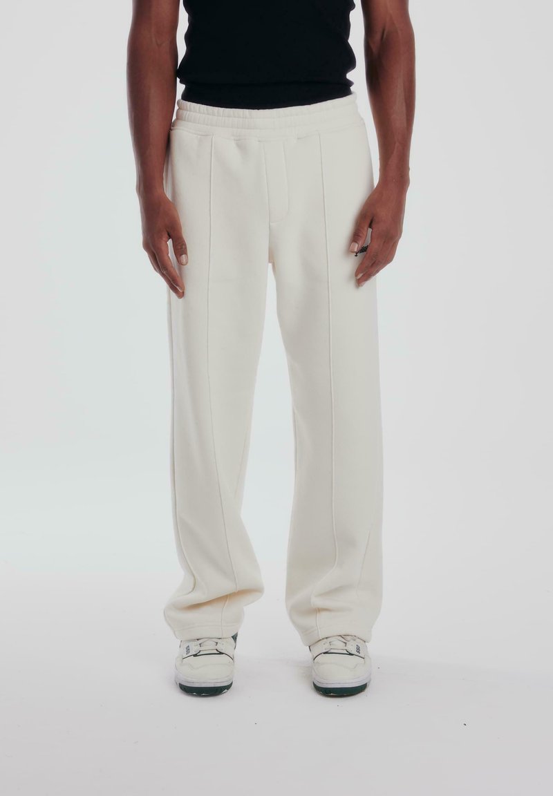 PROHIBITED LOOSE - Tracksuit bottoms - ecru