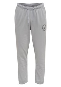 Hellgraue Jogginghose mit einem elastischen Bund und Kordelzug. Sie verfügt über ein kleines schwarzes Logo, das am linken Oberschenkel aufgedruckt ist. Weicher Stoff.