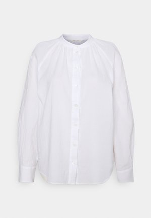 White long-sleeve button-up blouse with round neckline and subtle pleats at the shoulders, displayed against a plain background.