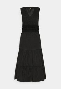 Schwarzes ärmelloses Kleid mit einem strukturierten Strickoberteil, Rüschendetails an der Taille und einem gestuften, fließenden Rock.