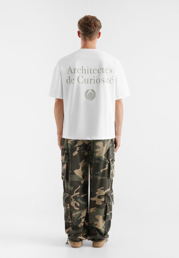 MAKANI UNISEX - Print T-shirt