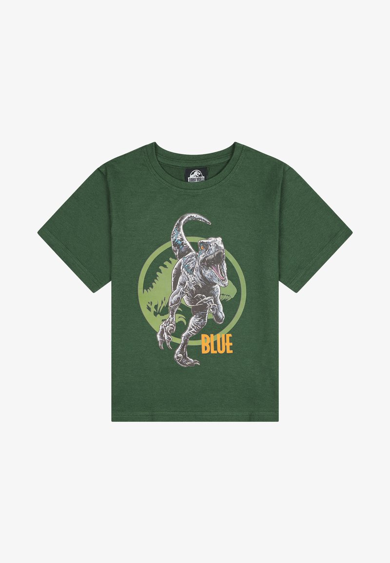 Camiseta de algodón verde con un gráfico de un dinosaurio y el texto "AZUL", sobre un diseño circular en verde más claro.