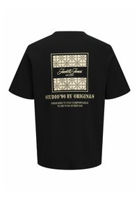 T-shirt noir à manches courtes avec motif floral beige et texte "Jack & Jones est. 1990" et "STUDIO'90 BY ORIGINALS" au dos.