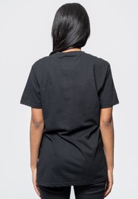 Paradiso Clothing NIRVANA SORBET RAY GRUNGE SMILE - Print T-shirt - black