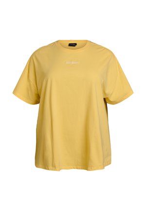 Geltoni medvilniniai marškinėliai laisvo kirpimo, trumpomis rankovėmis ir mažu baltu logotipu priekyje. Lygus audinys ir paprastas dizainas.