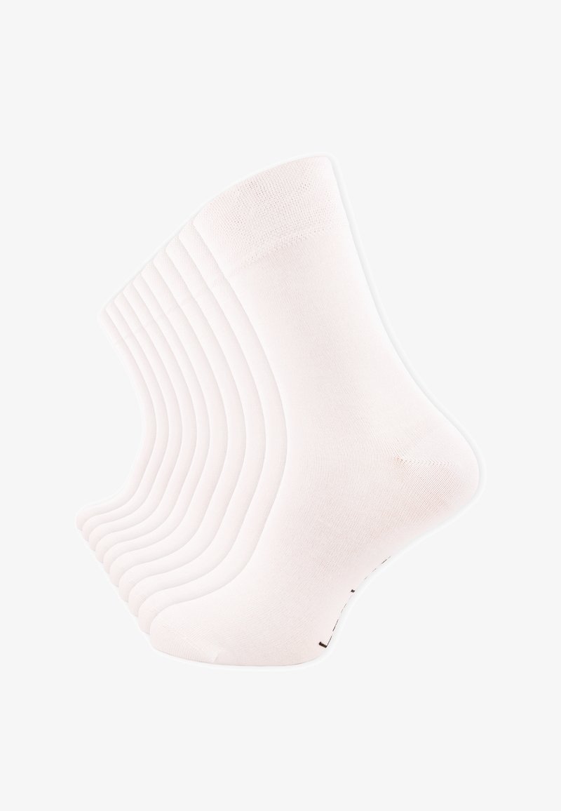 Chaussettes blanches en coton disposées en rangées décalées, avec une texture lisse, des poignets côtelés et un détail de bout renforcé.
