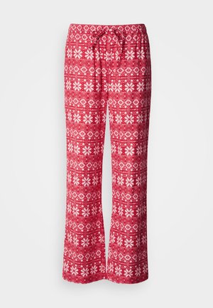Red pajama pants with white floral and geometric patterns, elastic waistband with a drawstring, wide legs, made from soft fabric.