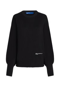 Mustast ribadest kootud sviiter pikade varrukatega, mille esiküljel on allääres tikand "Karl Lagerfeld Jeans".