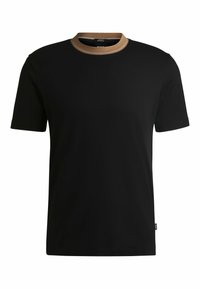 T-shirt nera con scollo rotondo e colletto beige a contrasto. Realizzata in tessuto morbido, presenta maniche corte e una vestibilità standard.