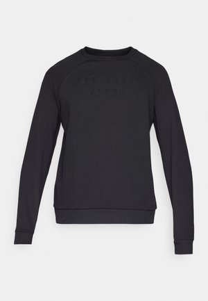 Fekete pulóver hosszú ujjal, kerek nyakkivágással, az elején finoman domborított "TED BAKER SPORT" felirattal. Puha anyag és laza kialakítás.