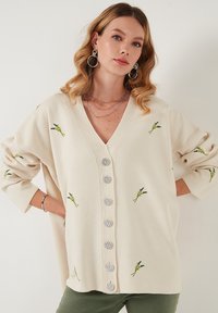 LELA Kardiganas - cream