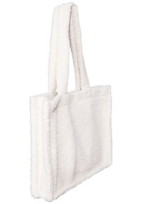 Witte, pluizige tote bag met twee handvatten, rechthoekige vorm, textuurafwerking en strakke lijnen; zacht materiaal geeft een gezellige uitstraling.