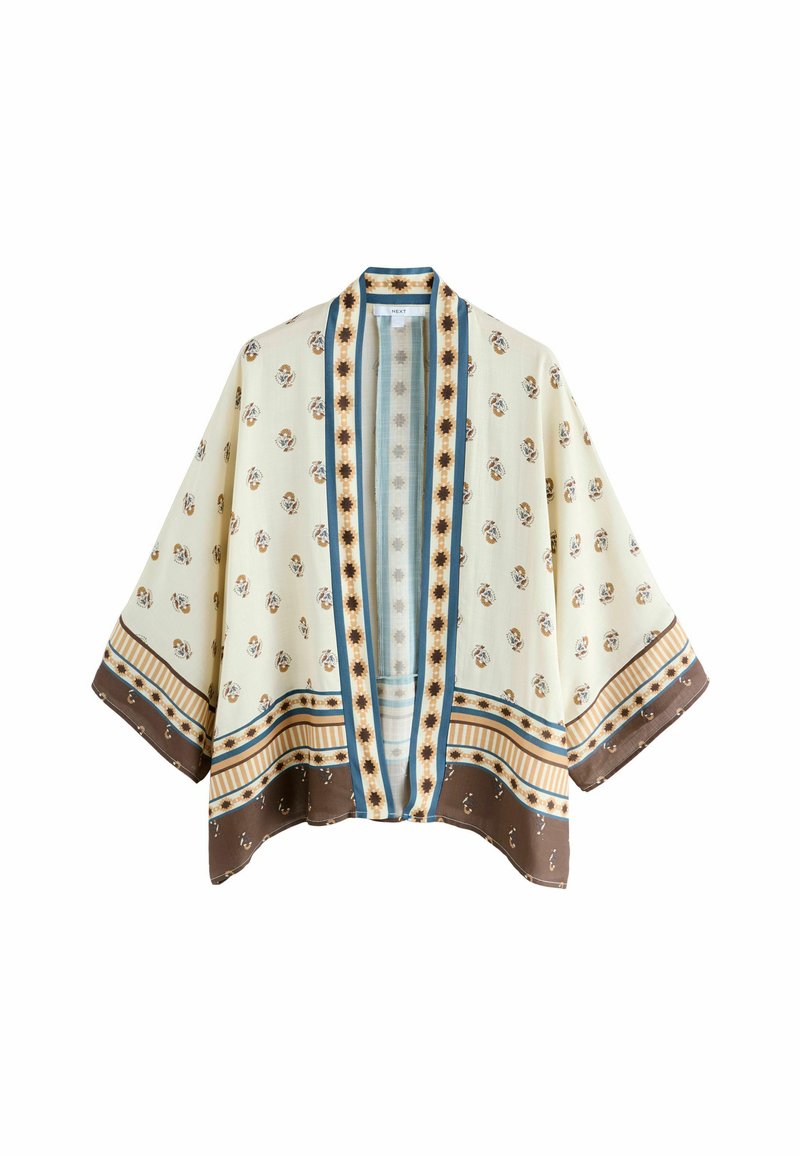Veste de style kimono imprimée en crème, avec des motifs floraux, des accents bleus et bruns, et une coupe ample.