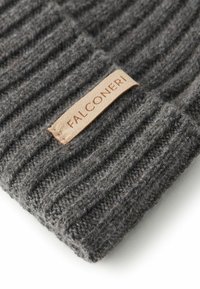 Gray ribbed knit beanie made of wool, featuring a leather tag with "FALCONERI" embossed, showcasing a soft and textured finish.