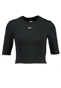 T-shirt noir court en matériau extensible, avec un col rond et des manches trois-quarts. Petit logo Nike blanc situé sur la poitrine.