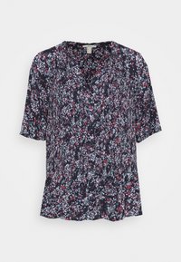 Blomstret bluse med en mørk navy baggrund og mønstre i pink, hvidt og blåt. Korte ærmer, v-udskæring og knaplukning foran.