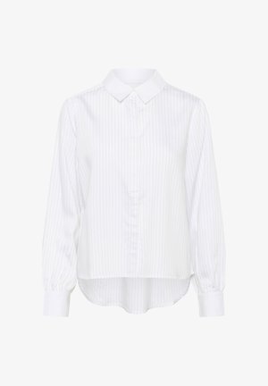 Valge pika varrukaga särk siniste vertikaalsete triipudega, klassikalise kraega, esikinnis nööpidega ja veidi ümarate äätega. Pehme kangas, kogutud varrukaotsad.