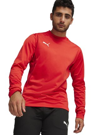 Rood langemouw sportshirt met ronde hals, gemaakt van gladde stof. Heeft een wit Puma-logo op de borst.