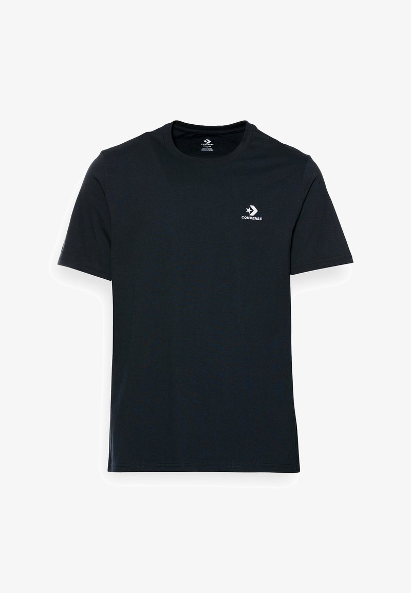 T-shirt noir à manches courtes et col rond avec petit logo blanc Converse sur la poitrine gauche sur fond blanc.