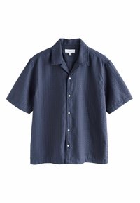 Short-sleeve navy button-up shirt in textured fabric with a spread collar and white buttons. Features a relaxed fit and subtle pattern.