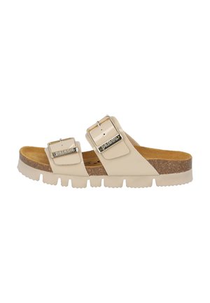 Beige rubber slide sandal with two adjustable silver-buckle straps and a textured cork footbed. Features a ridged rubber outsole.