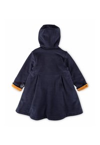 Abito con cappuccio in blu navy, maniche lunghe e polsino a fantasia arancione. Tessuto liscio con gonna svasata e design delle pieghe sul retro.