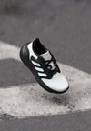 TENSAUR RUN 3.0 UNISEX - Road running shoes - core black/footwear white