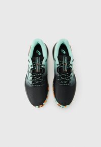 Pair of black and teal athletic shoes with patterned soles and branded laces, viewed from above on a white background.