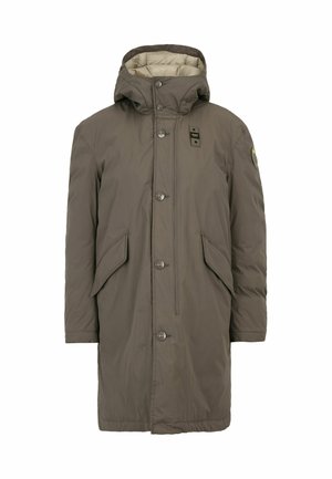 Long, olive green parka with a hood, front buttons, large side pockets, and a quilted inner lining. Features a logo on the sleeve.