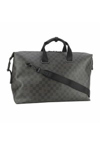 Sac de sport à carreaux noirs avec des accents en cuir noir, poignées supérieures doubles, bandoulière amovible et fermeture à glissière. Surface texturée.