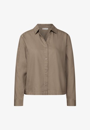 Brązowa, długosleeve z guzikami koszula z lekkiego materiału. Posiada wywinięty kołnierzyk i prosty dół oraz luźny krój.