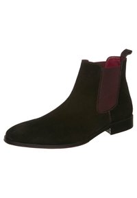 Mustat mokkanahkasaappaat nilkkapituisilla, joustavilla sivupaneeleilla, teräväkärkiset ja maroonin väriset kontrastivärit sisäpuolella. Litteä pohja ja yksinkertainen muotoilu.