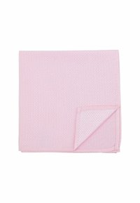Light pink cotton napkin with a textured pattern, featuring a folded corner showing a similar texture on both sides. Square shape.