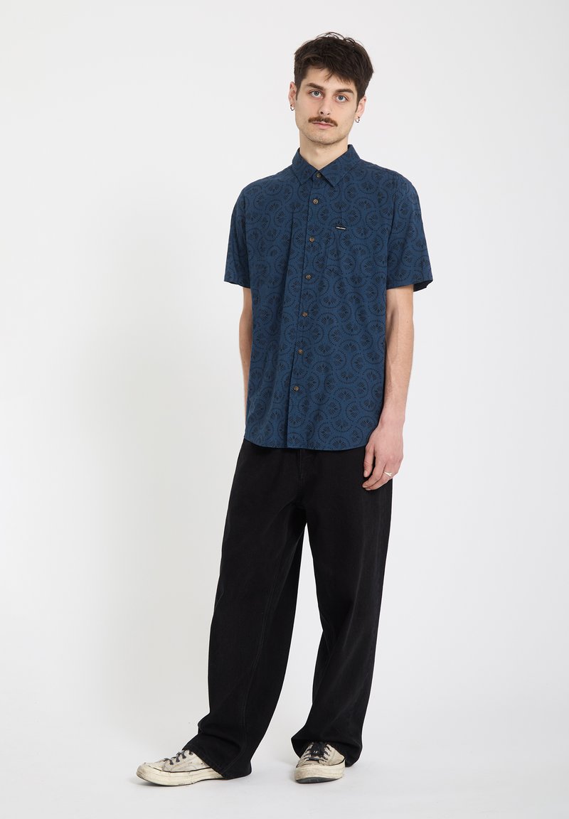 Camisa