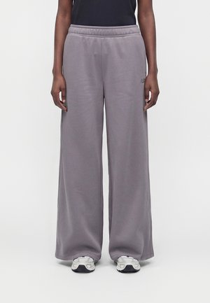 New Balance, BRUSHED COASTAL PANT - Долнище на анцуг - off-line grey