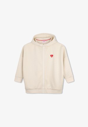 Crèmekleurige hoodie met een ritssluiting aan de voorkant en een rood hartlogo op de linkerborst met de tekst "HUGO" in witte letters.