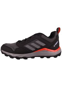 Black athletic shoe with gray mesh upper, rubber sole, orange accents, and gray stripes. Features a padded collar and pronounced tread pattern.