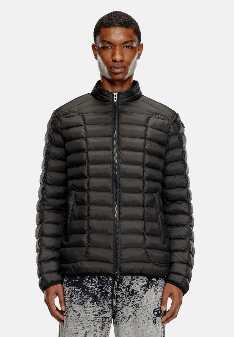 Black puffer jacket with a zip-front, high collar, quilted design, and side pockets, featuring a smooth, shiny texture.