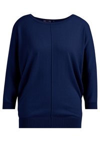 Námořnický modrý, nadměrný svetr vyrobený z měkké pleteniny. Má kulatý výstřih, tříčtvrteční rukávy a zvýrazněné ribované lemy.